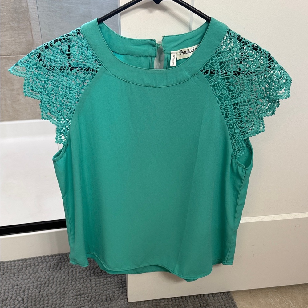 Teal Crochet Sleeve size large but fits more like a medium